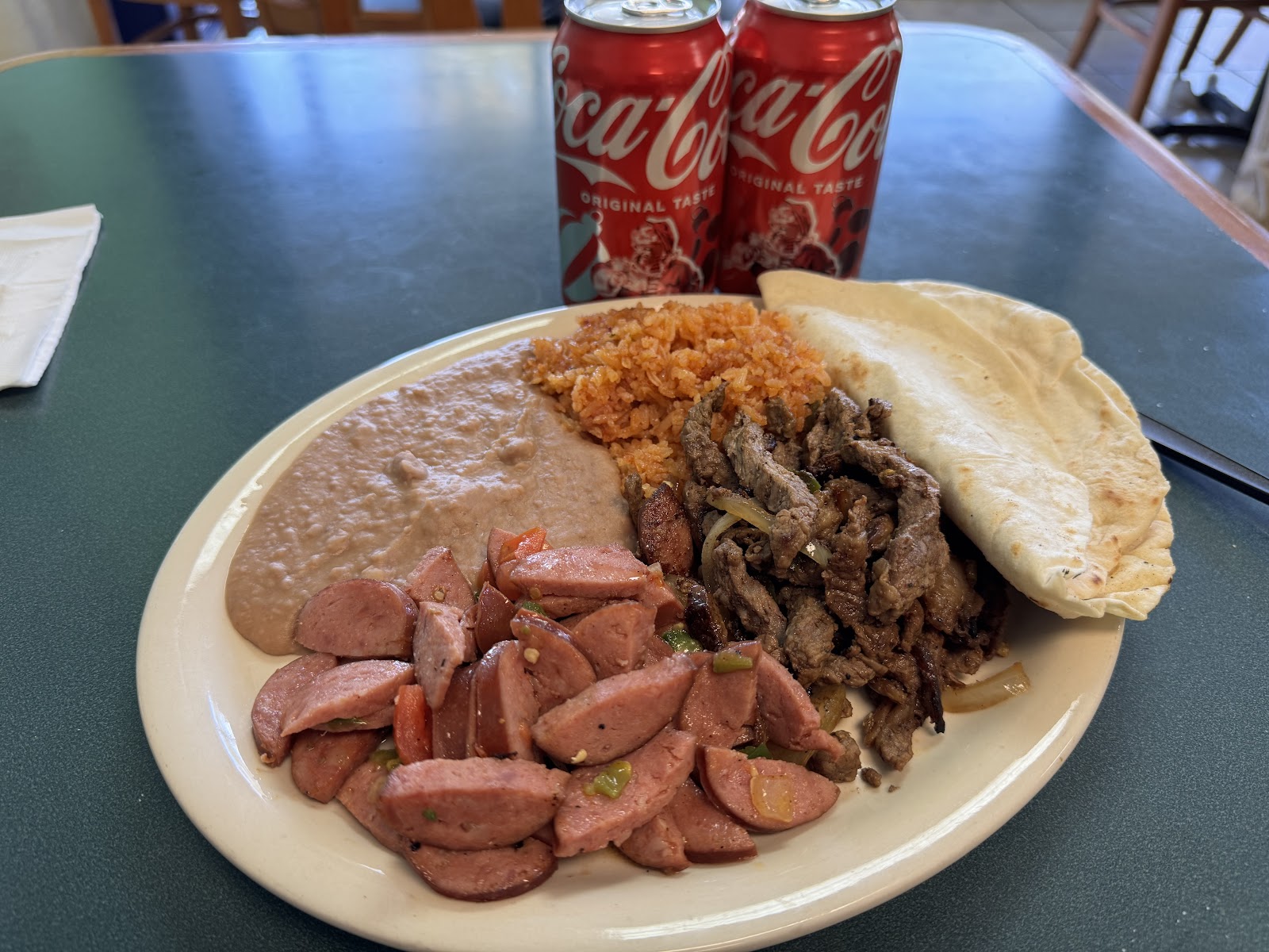 Beef fajita lunch plate with rice, beans and homemade tortillas